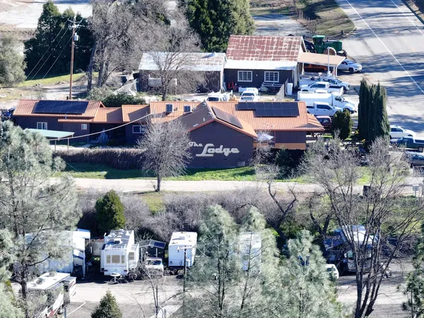 a view of a house with a back yard