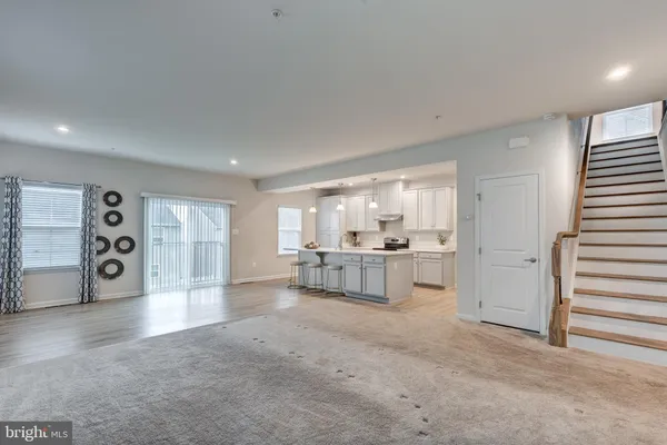 a kitchen with a sink a counter top space and appliances