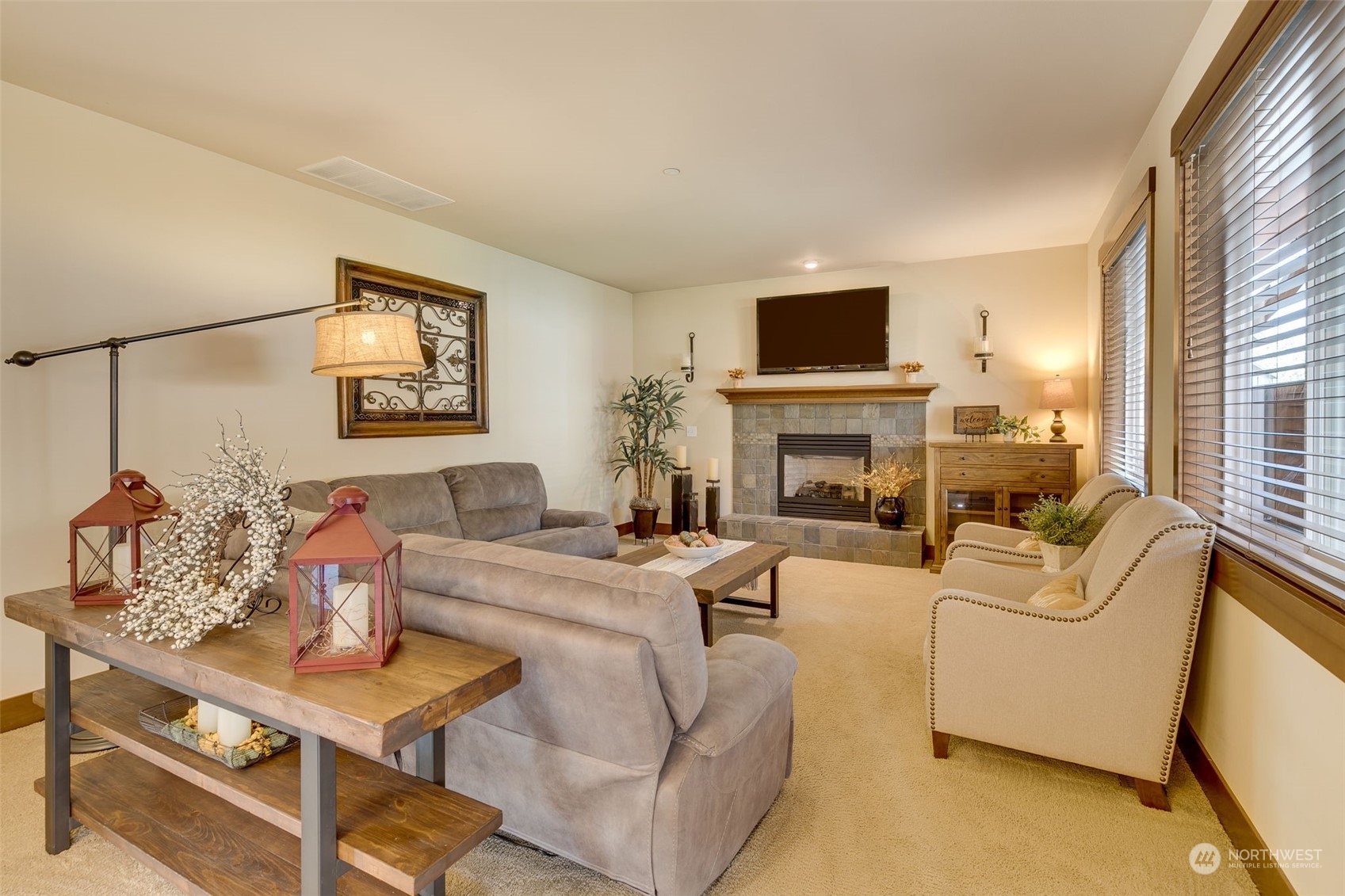 3119 223rd Street Southeast Bothell, WA 98021 - Photo 16 of 40 a living room with furniture fireplace and flat screen tv