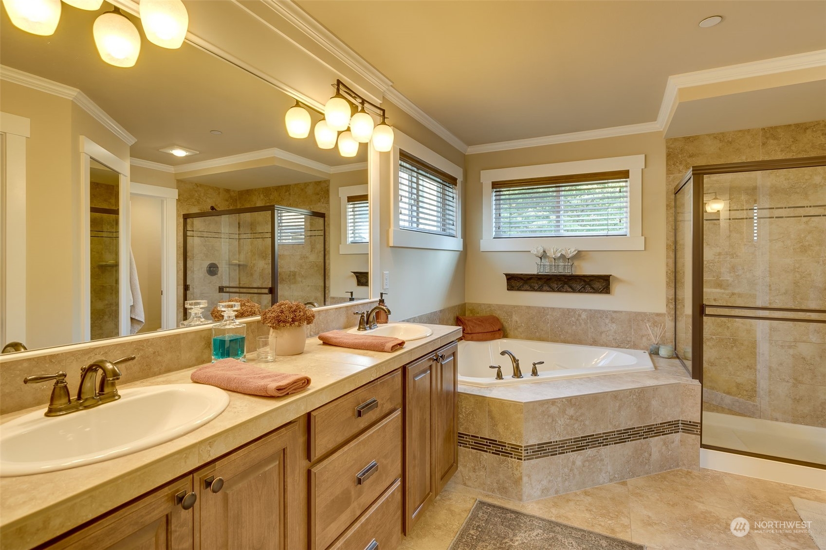 3119 223rd Street Southeast Bothell, WA 98021 - Photo 19 of 40 a spacious bathroom with a sink double vanity granite and a large mirror