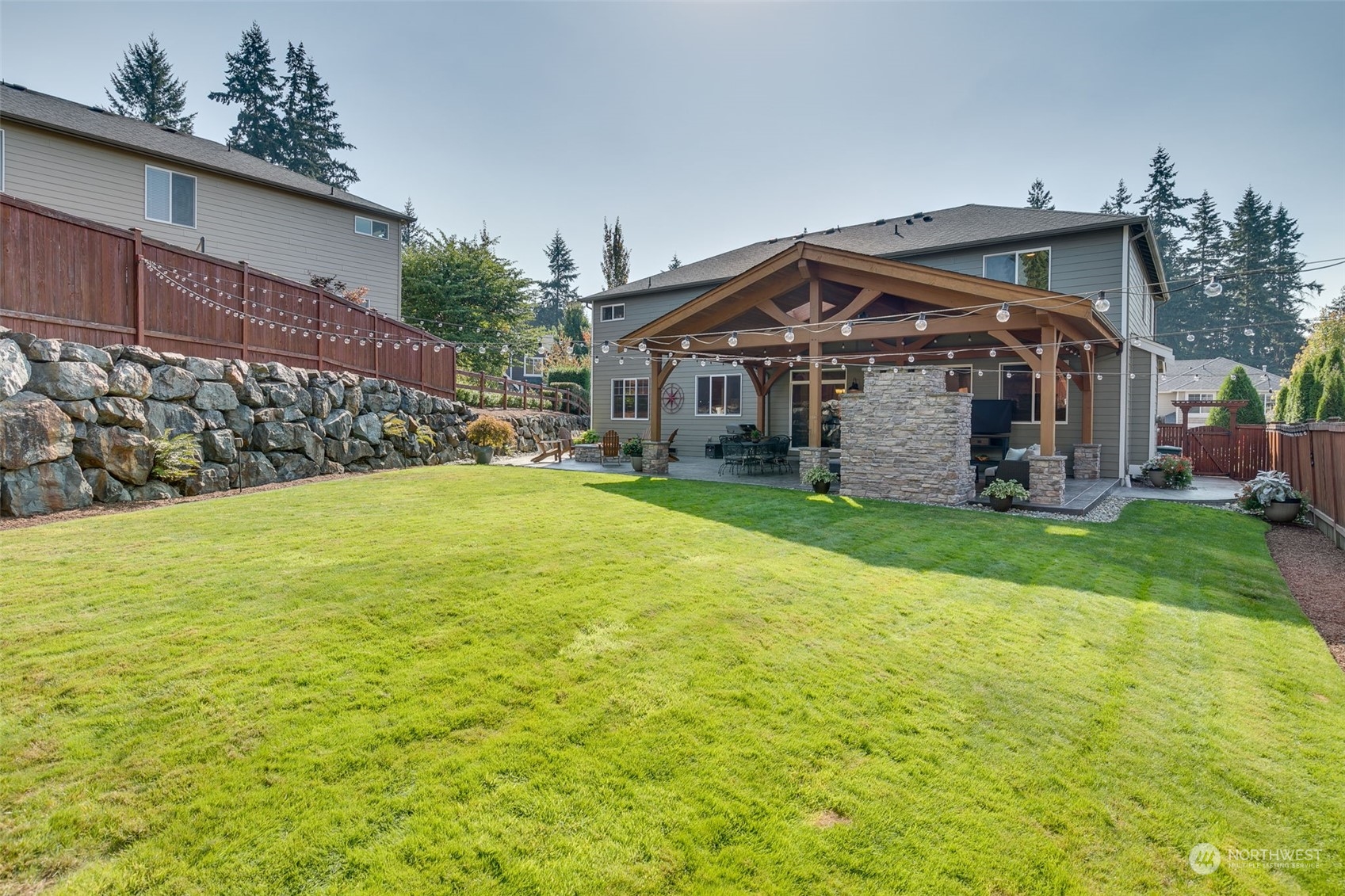 3119 223rd Street Southeast Bothell, WA 98021 - Photo 26 of 40 a view of a house with a yard
