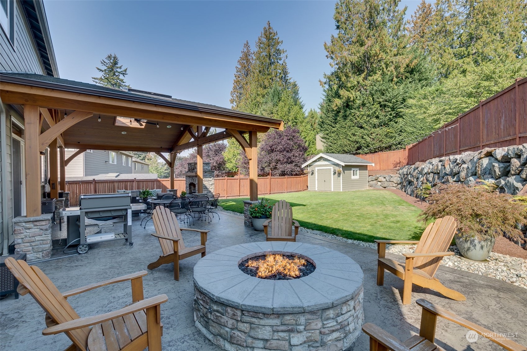 3119 223rd Street Southeast Bothell, WA 98021 - Photo 27 of 40 a view of a porch with furniture and yard