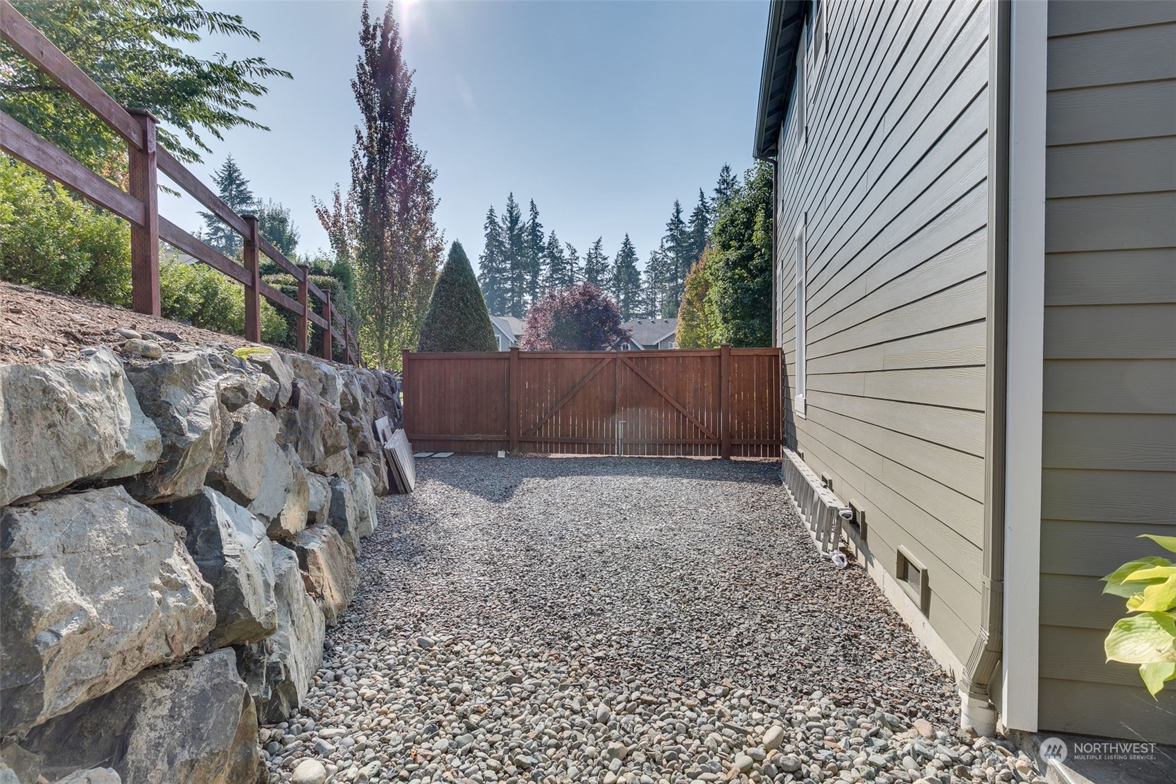 3119 223rd Street Southeast Bothell, WA 98021 - Photo 33 of 40 a view of a house with a backyard