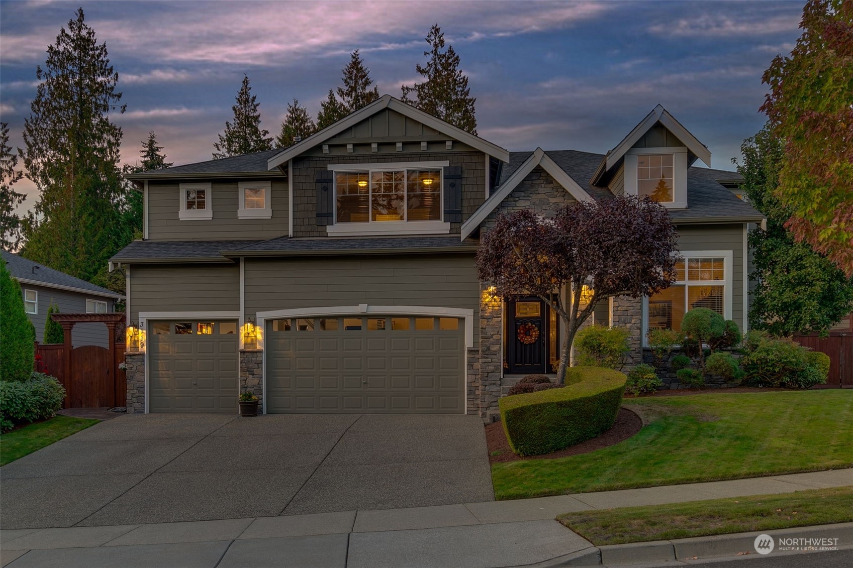 3119 223rd Street Southeast Bothell, WA 98021 - Photo 38 of 40 a front view of a house with a yard