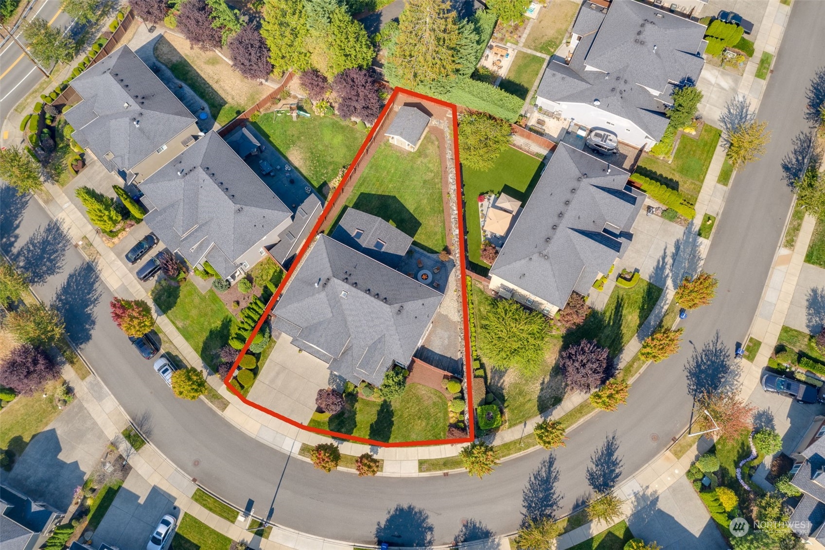 3119 223rd Street Southeast Bothell, WA 98021 - Photo 39 of 40 an aerial view of a house with a yard and trees
