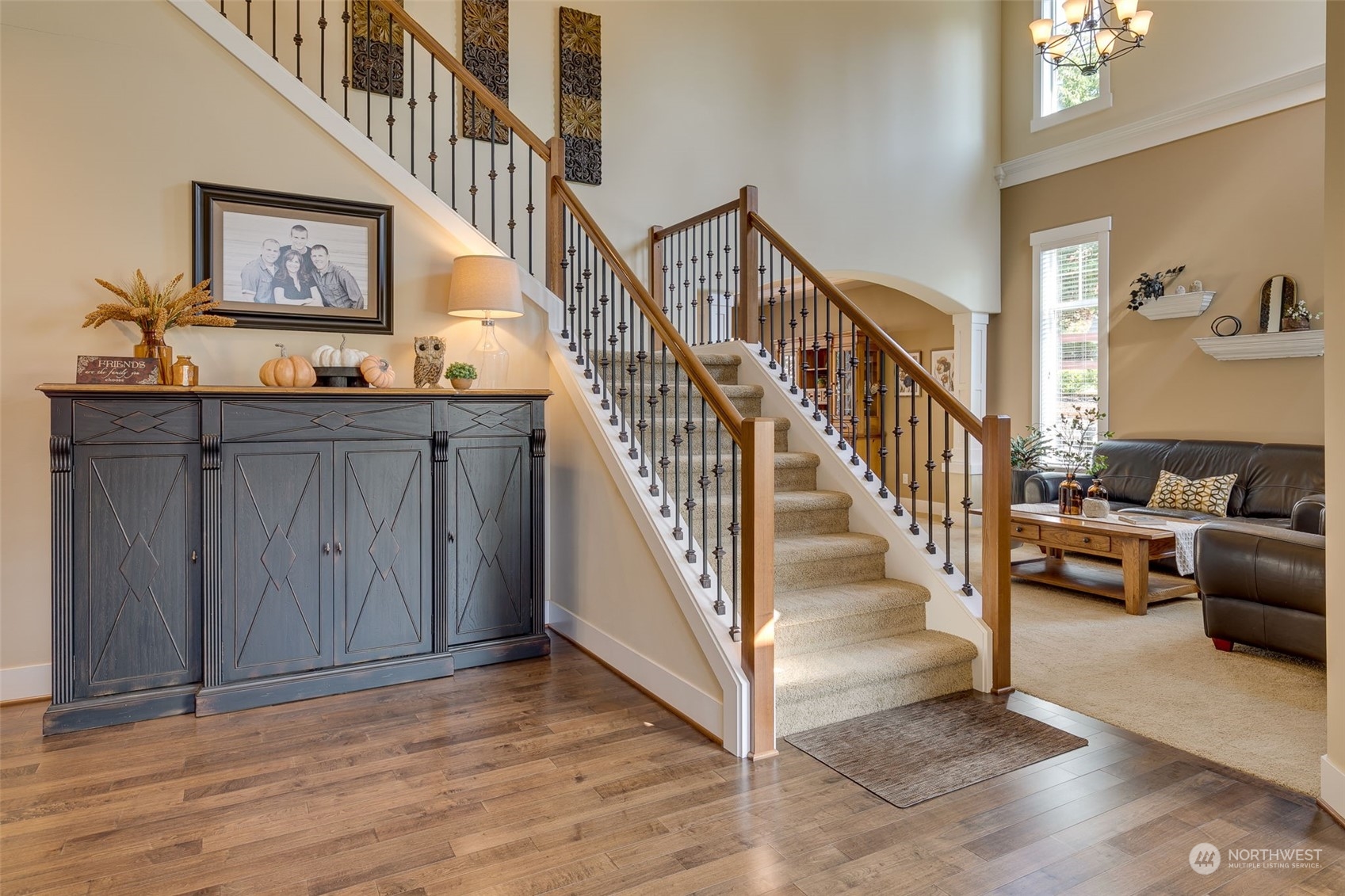 3119 223rd Street Southeast Bothell, WA 98021 - Photo 4 of 40 a view of entryway and hall with wooden floor