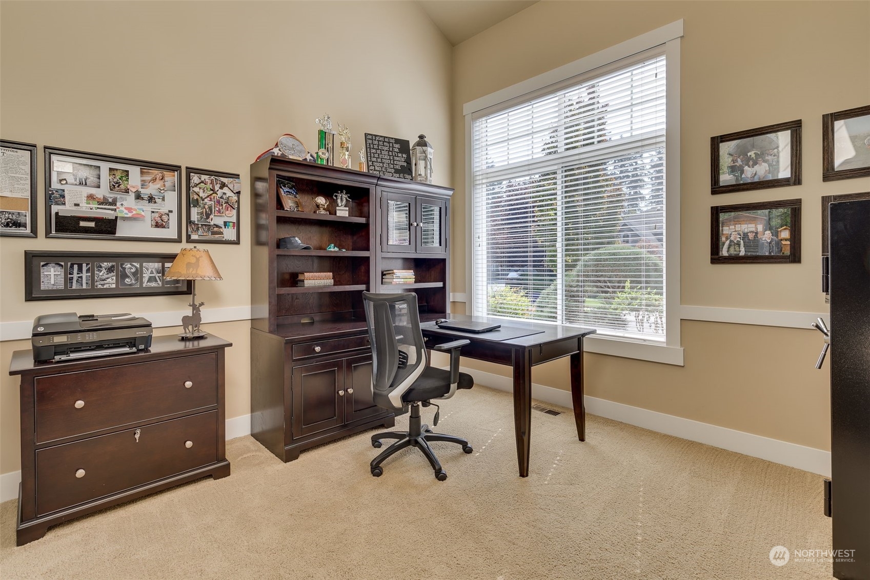 3119 223rd Street Southeast Bothell, WA 98021 - Photo 5 of 40 a view of a workspace with furniture