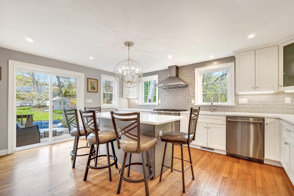 87 Payson Road Brookline, MA 02467 - Photo 11 of 41 a view of a dining room with furniture window and outside view