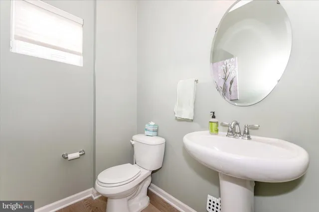 a view of a livingroom with wooden floor