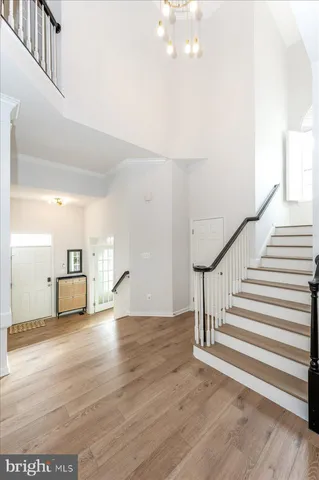 a view of livingroom with furniture and chandelier
