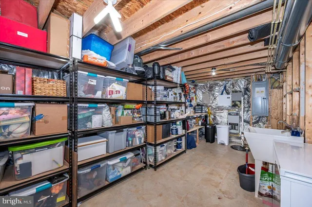 a view of balcony with wooden floor and outdoor seating
