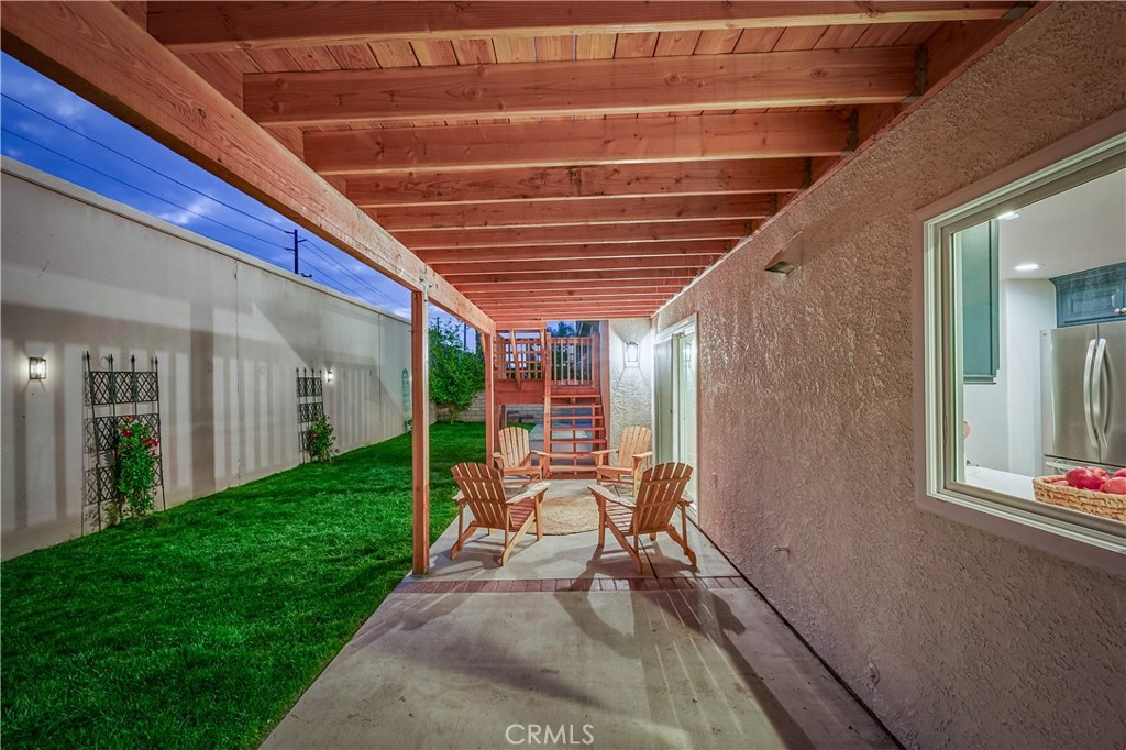 1626 Turquoise Drive Corona, CA 92882 - Photo 57 of 60 a view of a porch with furniture and garden