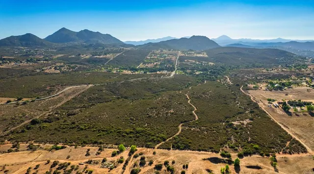 a view of a house with a mountain