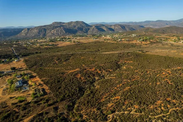 a view of ocean and mountain