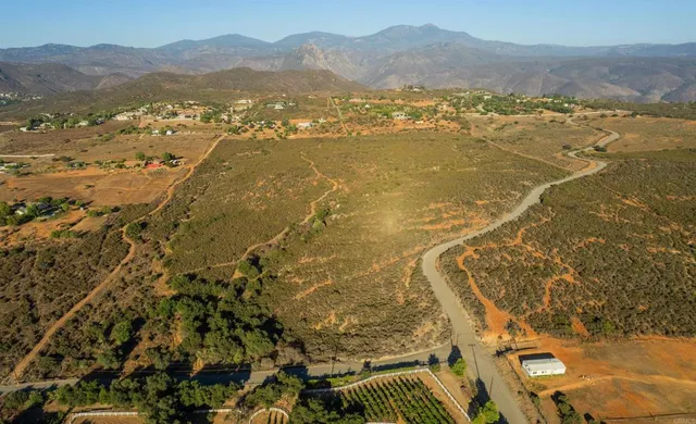 a view of an aerial view of residential houses with outdoor space