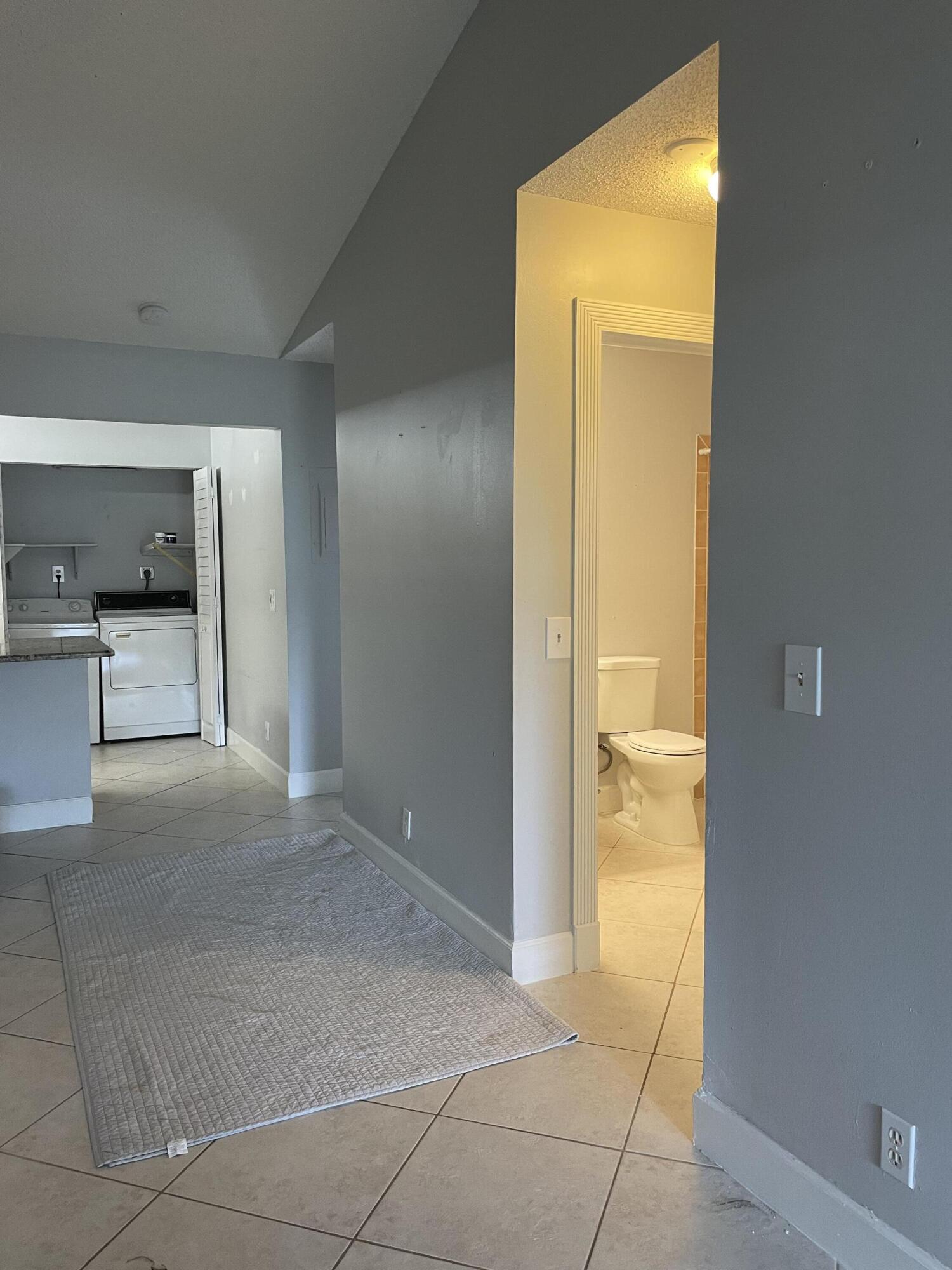 9037 Southeast Hobe Ridge Avenue Hobe Sound, FL 33455 - Photo 3 of 12 Living Room