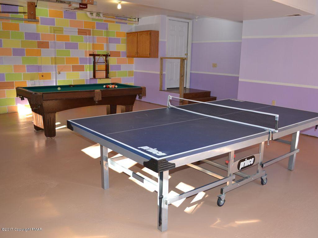 1044 Upper Ridge View Drive East Stroudsburg, PA 18302 - Photo 19 of 27 a room with pool table and windows