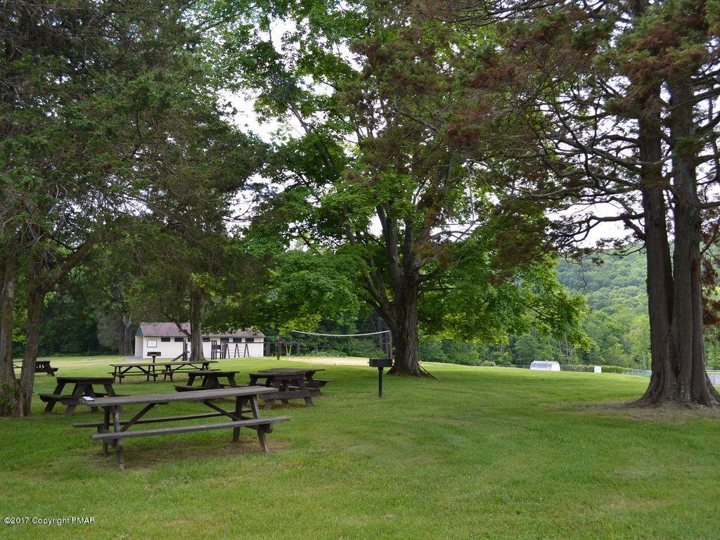 1044 Upper Ridge View Drive East Stroudsburg, PA 18302 - Photo 23 of 27 a view of a bench in a garden