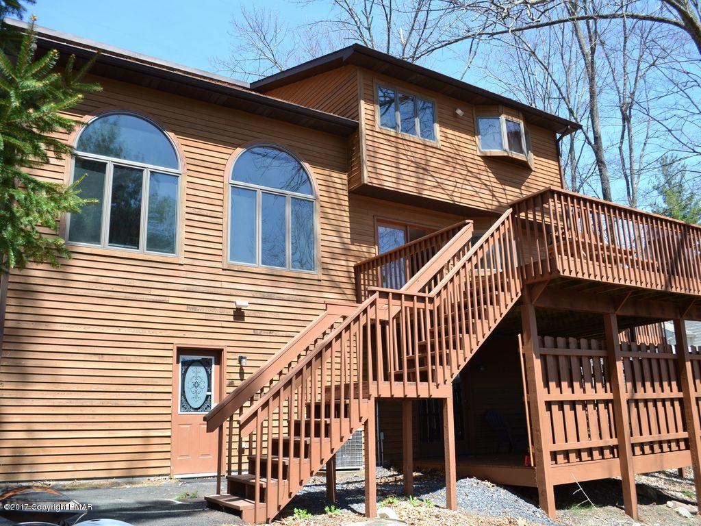 1044 Upper Ridge View Drive East Stroudsburg, PA 18302 - Photo 7 of 27 a view of a house with wooden deck
