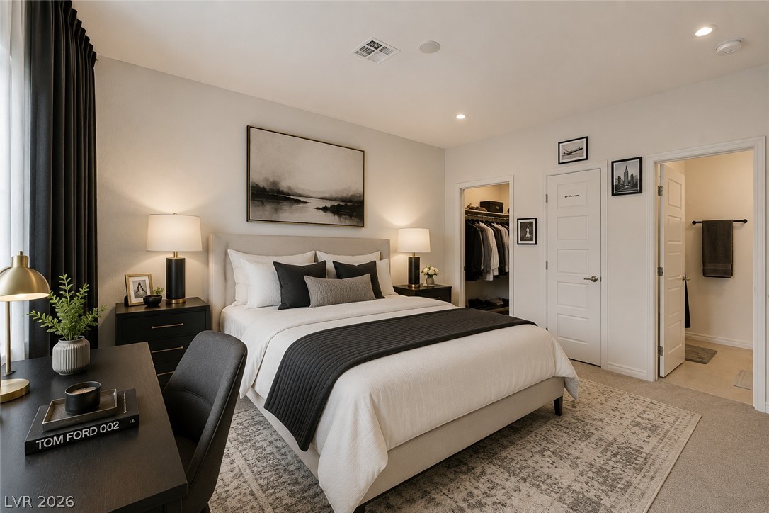7330 North Decatur Boulevard, Unit 6 North Las Vegas, NV 89084 - Photo 10 of 42 A well-appointed sleeping sanctuary featuring soft carpet flooring and abundant natural light.