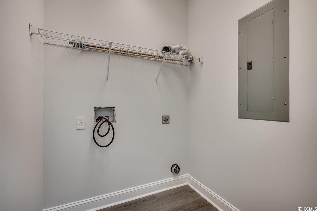 999 Algonquin Drive, Unit E Pawleys Island, SC 29585 - Photo 18 of 37 Laundry area featuring hookup for a washing machine, laundry area, baseboards, electric panel, and electric dryer hookup