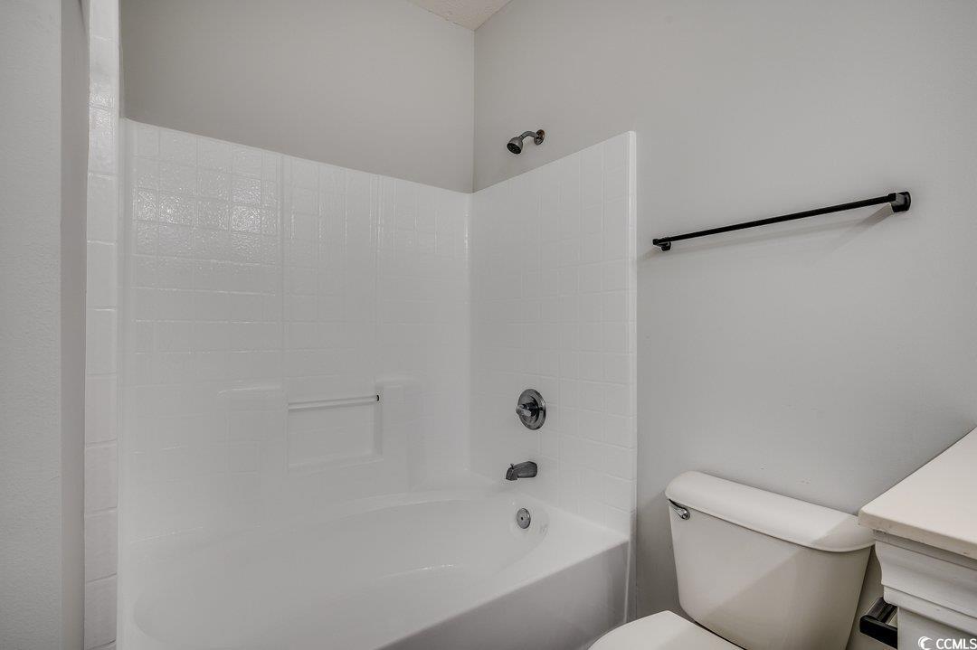999 Algonquin Drive, Unit E Pawleys Island, SC 29585 - Photo 23 of 37 Full bathroom featuring toilet and tub / shower combination