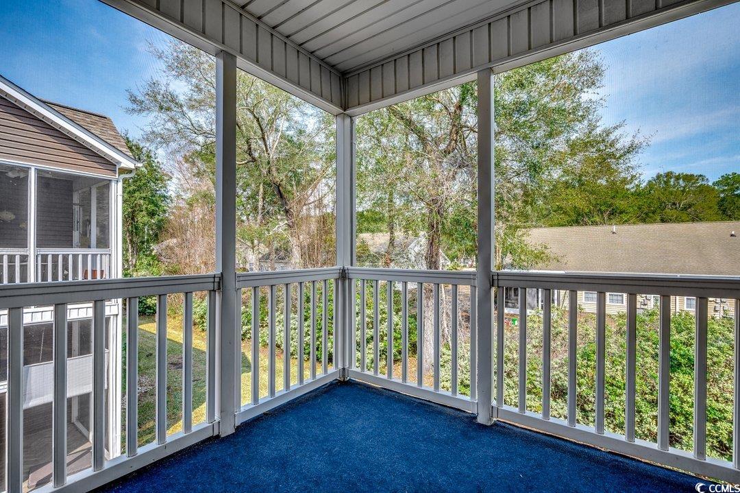 999 Algonquin Drive, Unit E Pawleys Island, SC 29585 - Photo 25 of 37 View of unfurnished sunroom