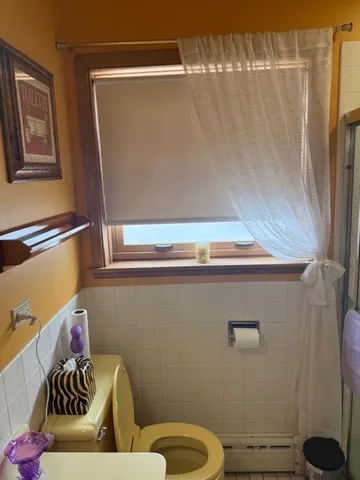 a bathroom with a toilet