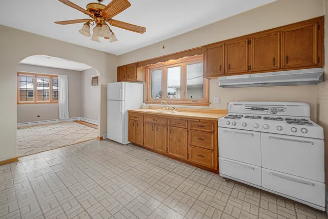 a view of a kitchen with cabinets