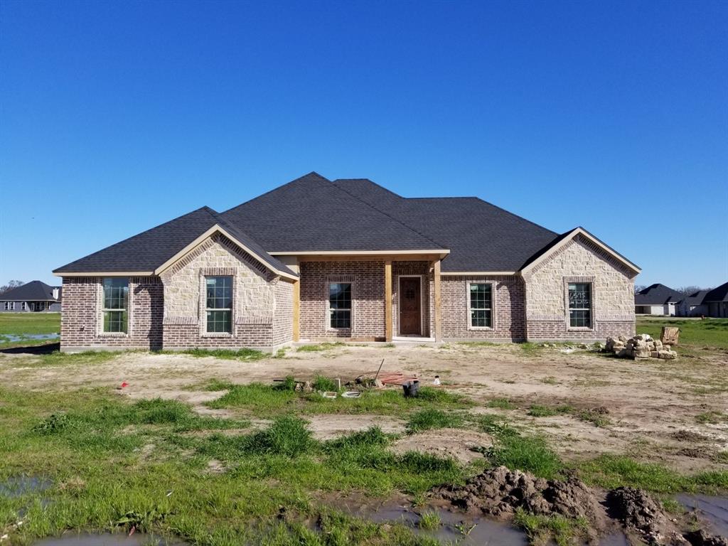 6595 Oak Point Circle Royse City, TX 75189 - Photo 1 of 1 a front view of a house with a yard