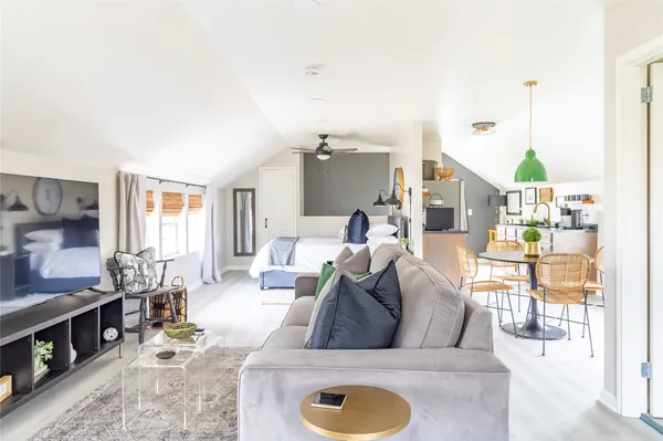 a living room with furniture and a couch