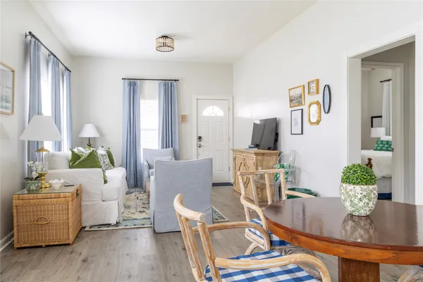 a kitchen with stainless steel appliances a stove a sink and a microwave