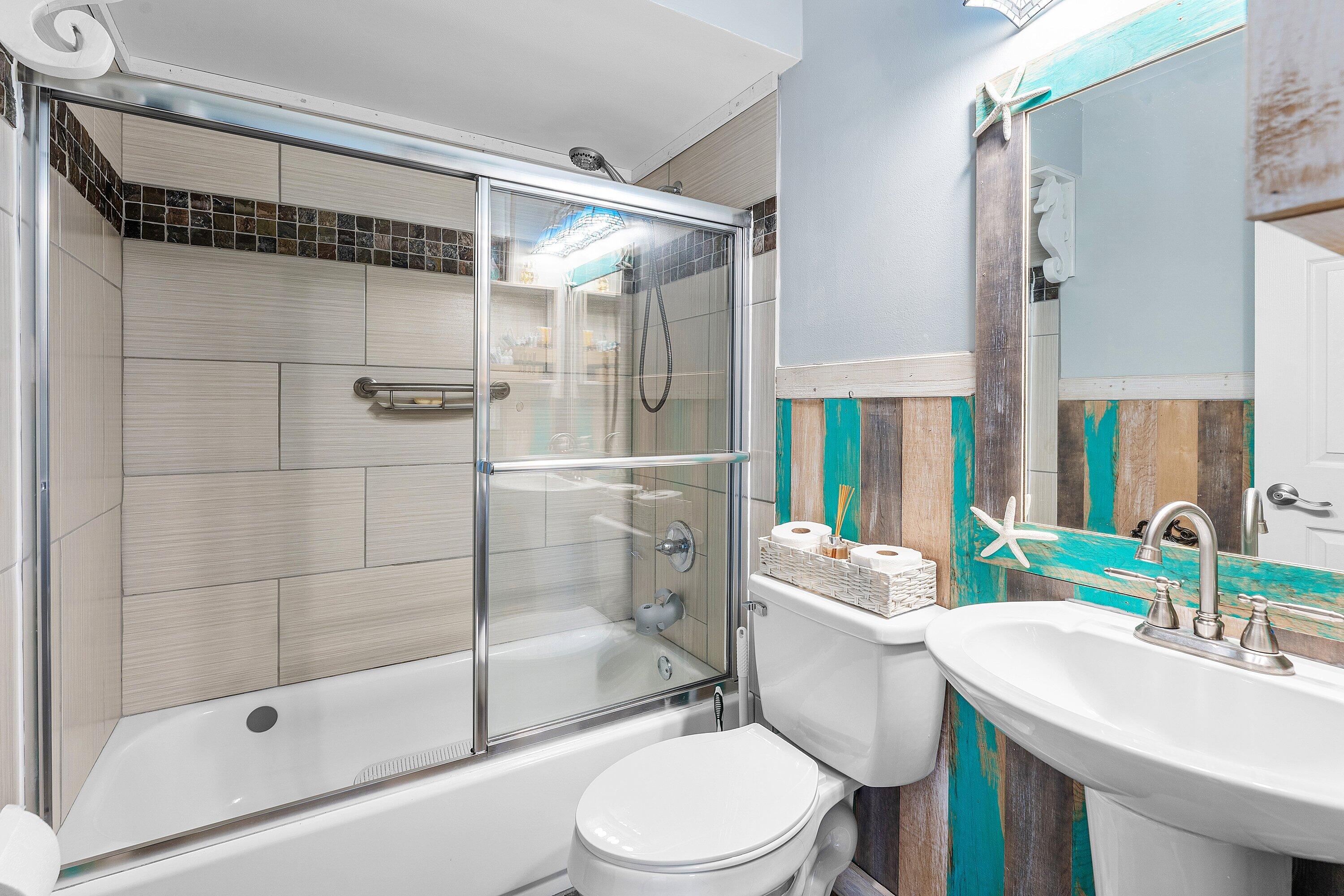 2114 Southeast Midtown Road Port St. Lucie, FL 34952 - Photo 20 of 41 a bathroom with a sink toilet and shower