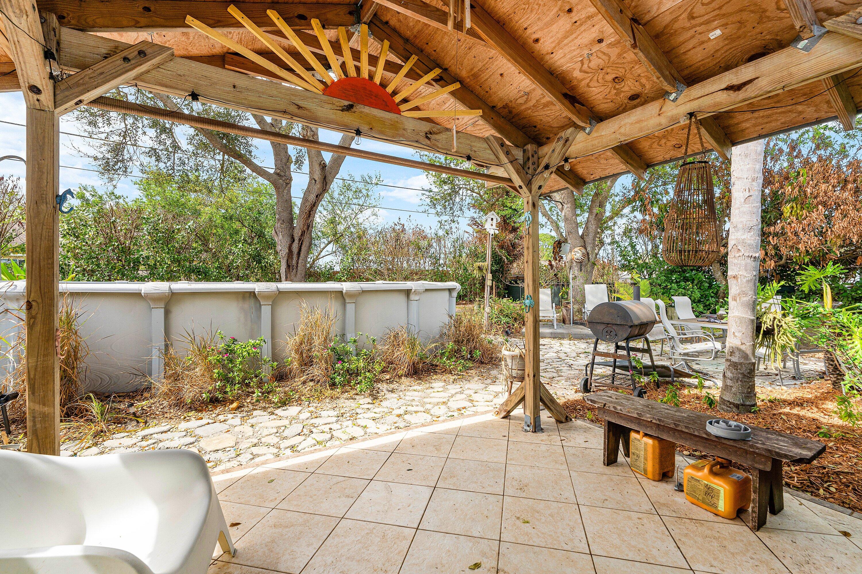 2114 Southeast Midtown Road Port St. Lucie, FL 34952 - Photo 21 of 41 a outdoor living space with furniture