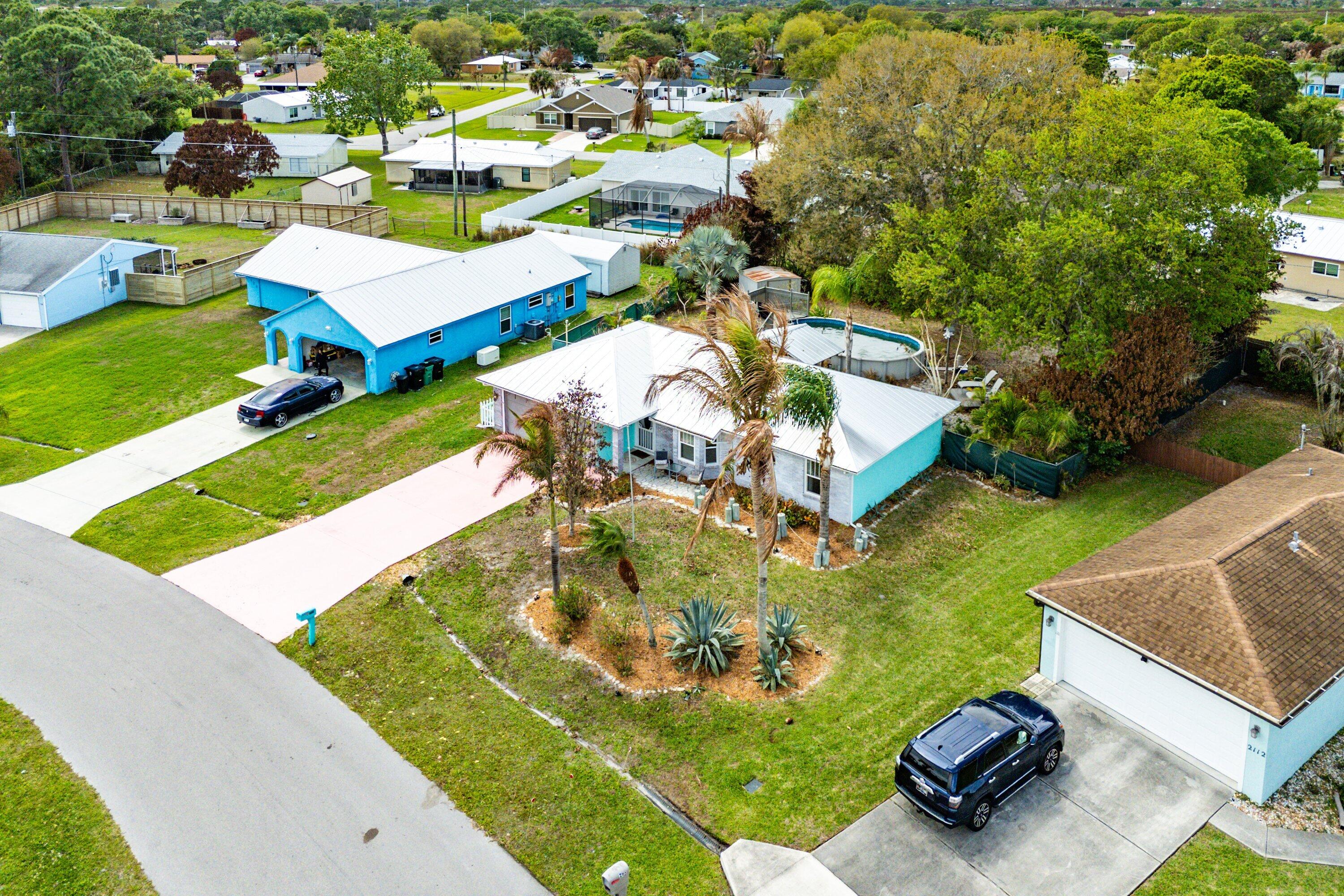 2114 Southeast Midtown Road Port St. Lucie, FL 34952 - Photo 28 of 41 an aerial view of a house with outdoor space