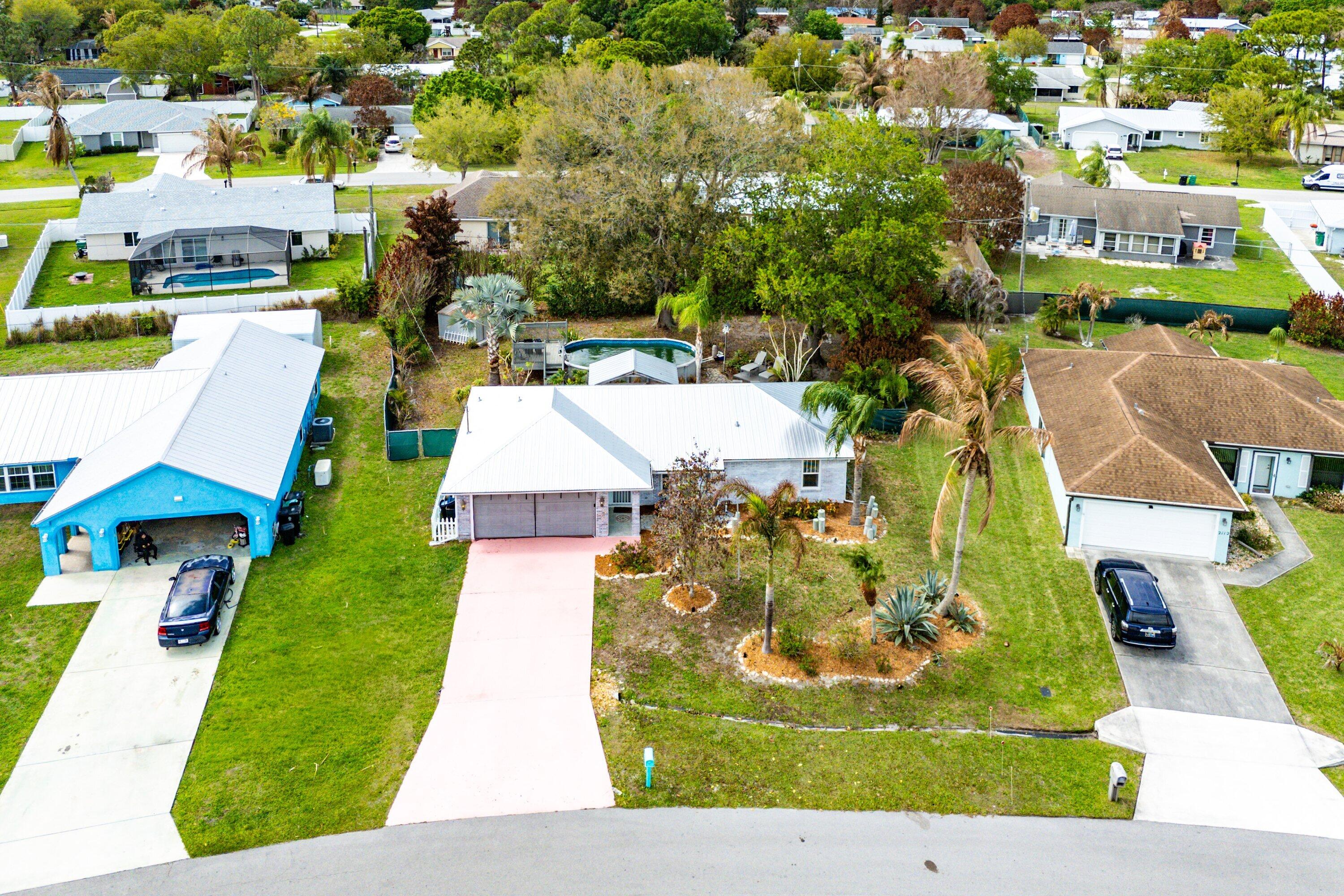 2114 Southeast Midtown Road Port St. Lucie, FL 34952 - Photo 29 of 41 a view of a swimming pool