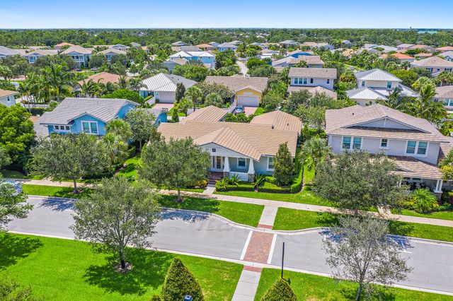 an aerial view of a house with a garden
