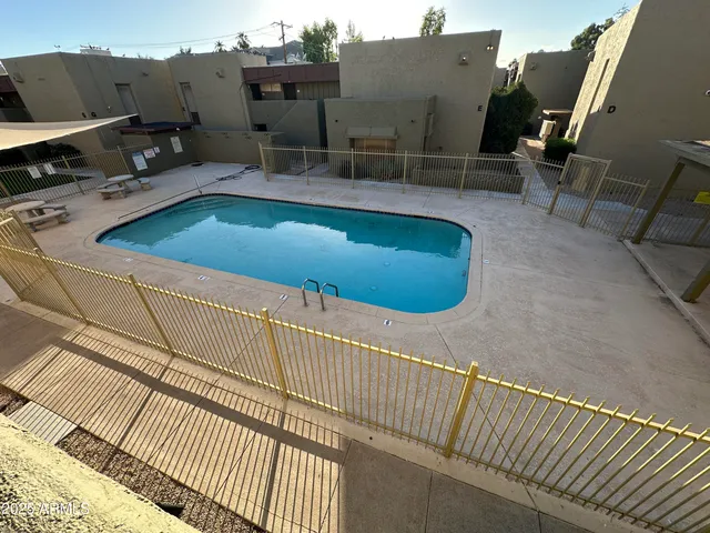 a view of a balcony with chairs