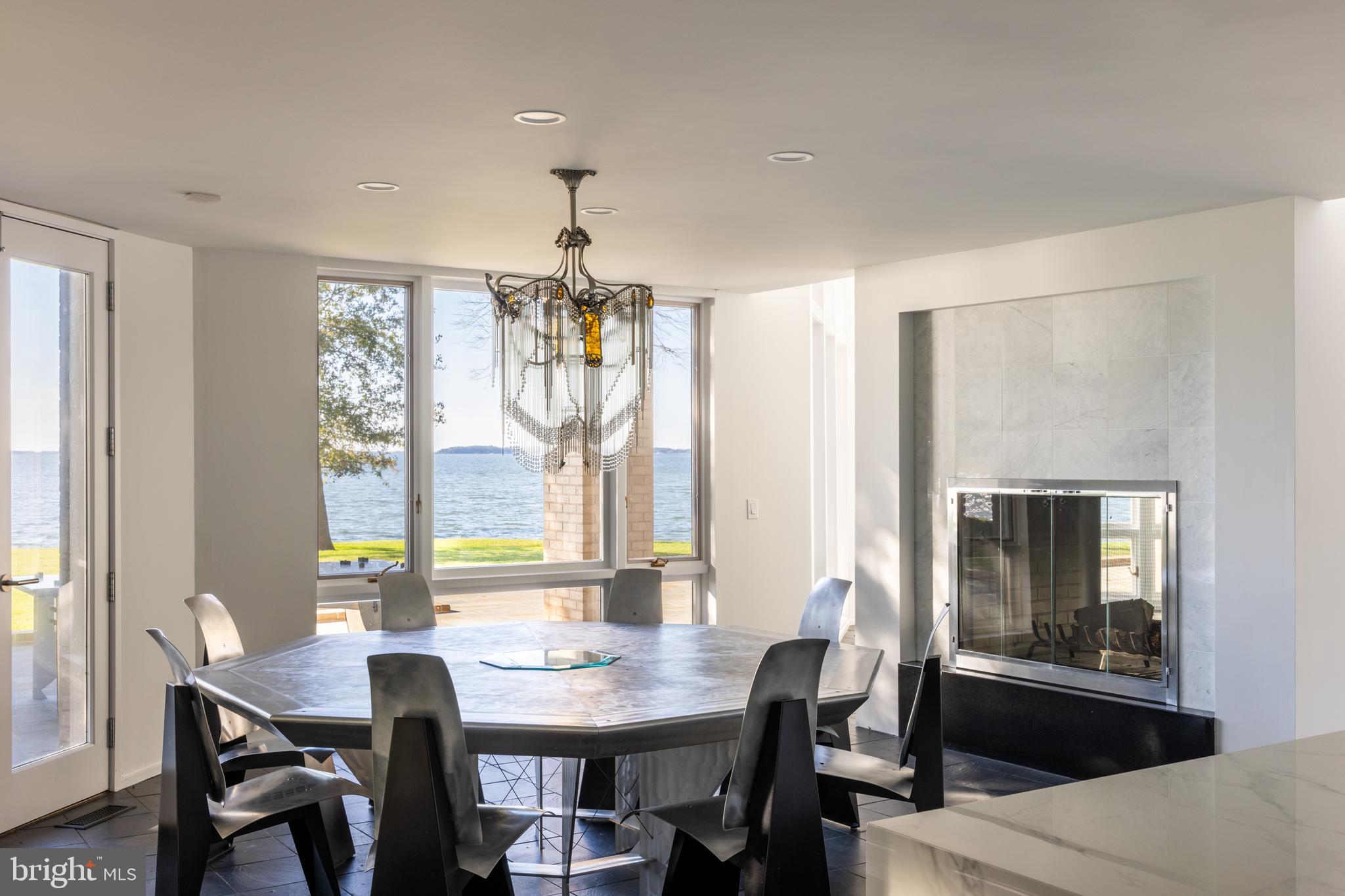 5084 Ferry Neck Road Royal Oak, MD 21662 - Photo 18 of 58 a view of a dining room with furniture window and outside view