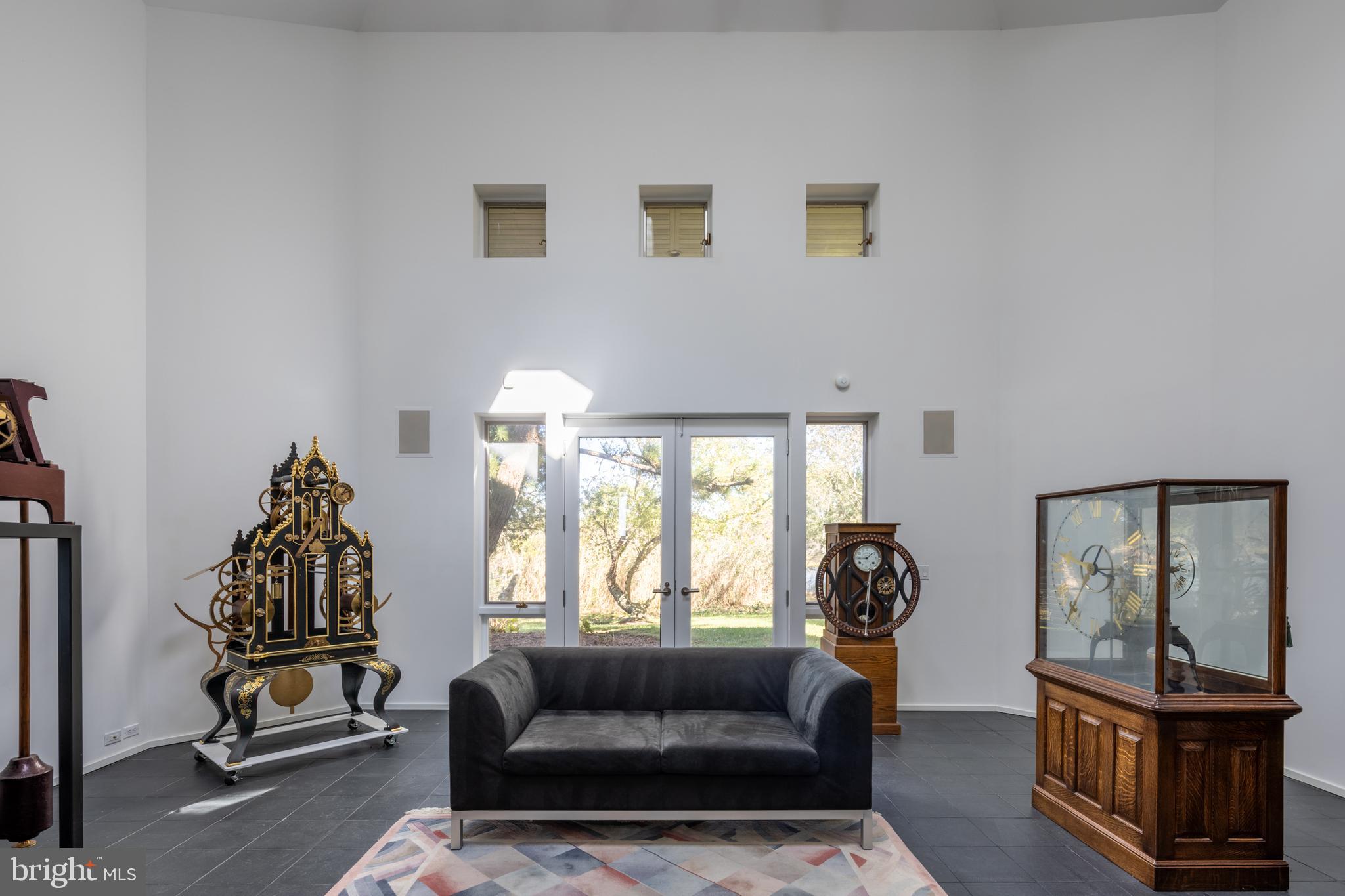 5084 Ferry Neck Road Royal Oak, MD 21662 - Photo 24 of 58 a living room with furniture and a window