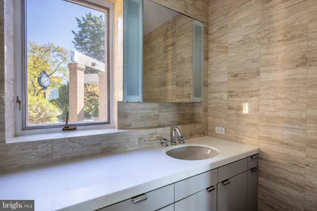 a view of a living room with a large window
