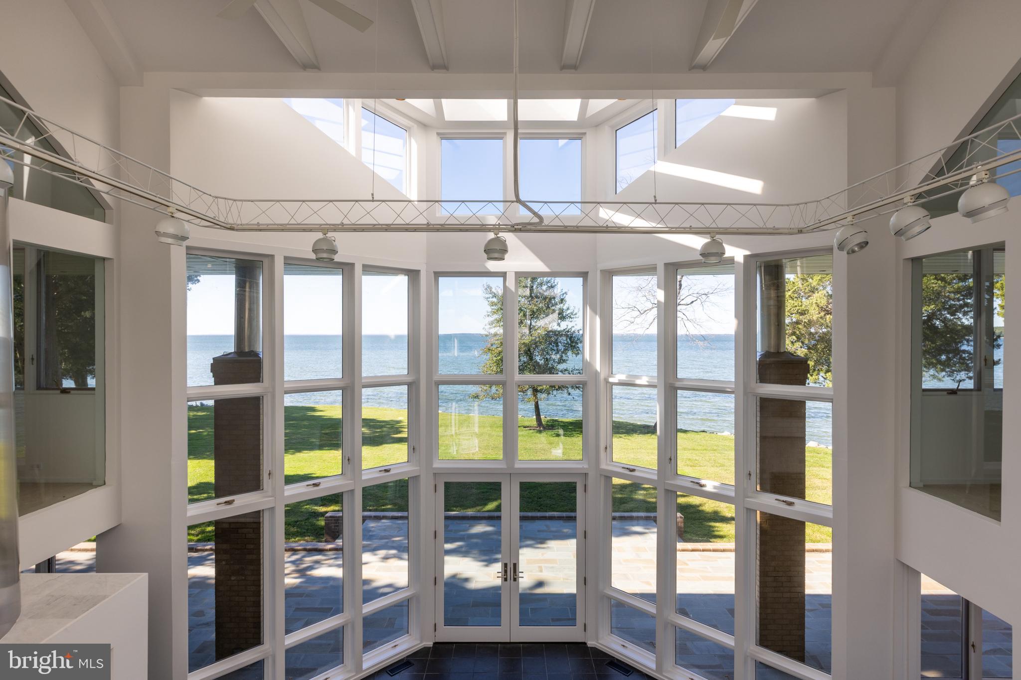 5084 Ferry Neck Road Royal Oak, MD 21662 - Photo 29 of 58 a view of a living room with a large window