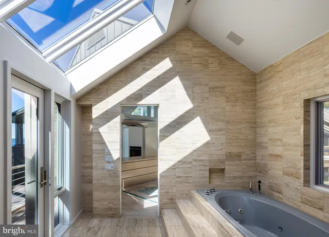 a view of a house with backyard and porch