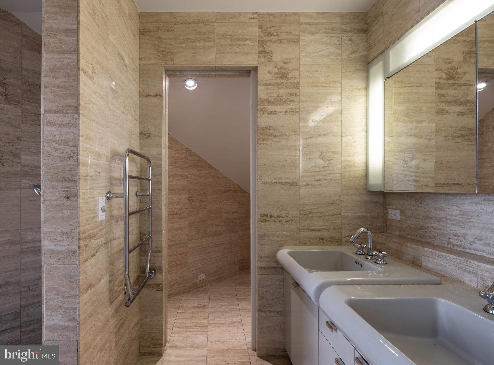 5084 Ferry Neck Road Royal Oak, MD 21662 - Photo 36 of 58 a bathroom with a sink shower and a mirror