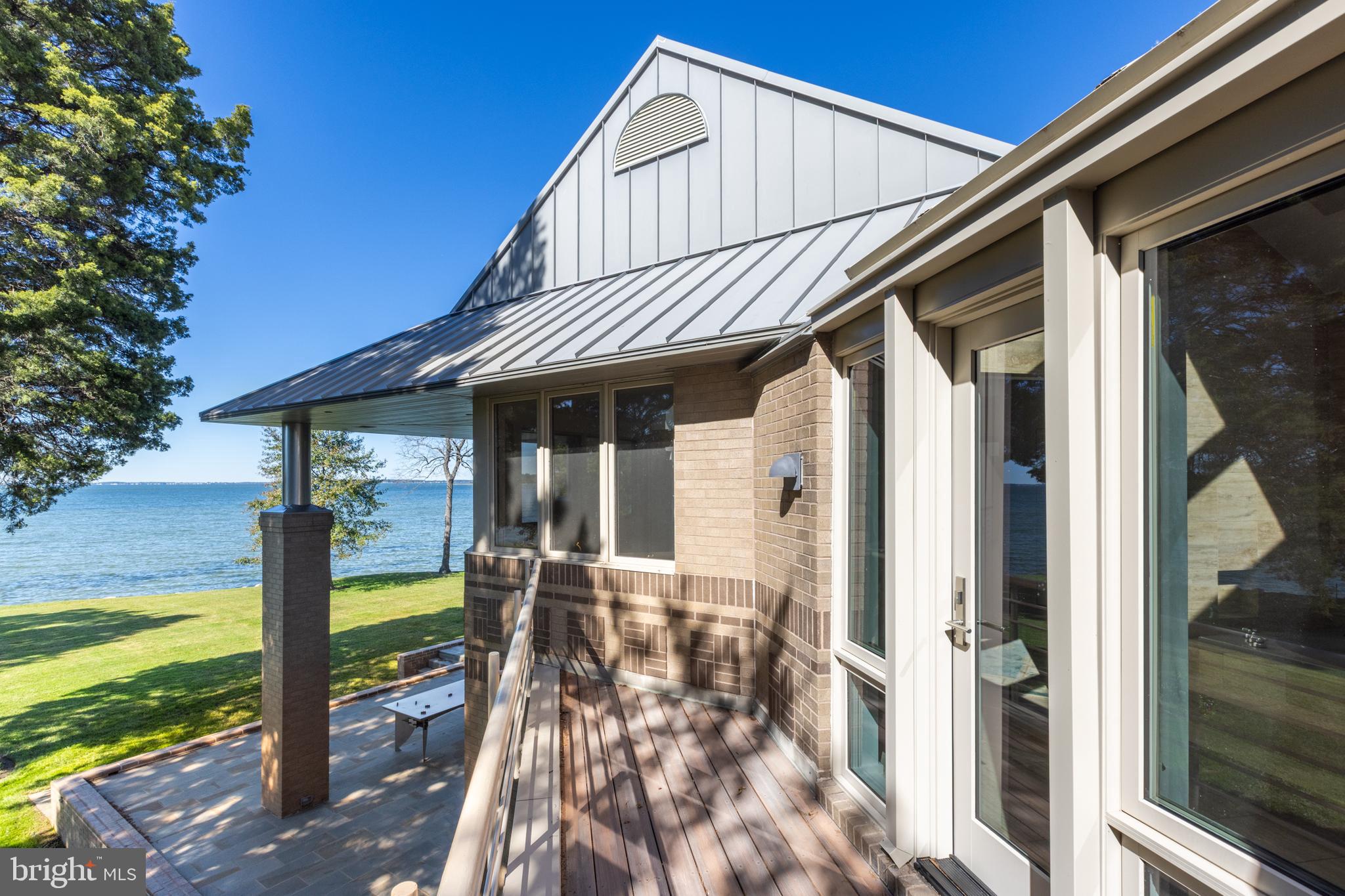 5084 Ferry Neck Road Royal Oak, MD 21662 - Photo 39 of 58 a view of a house with backyard and porch