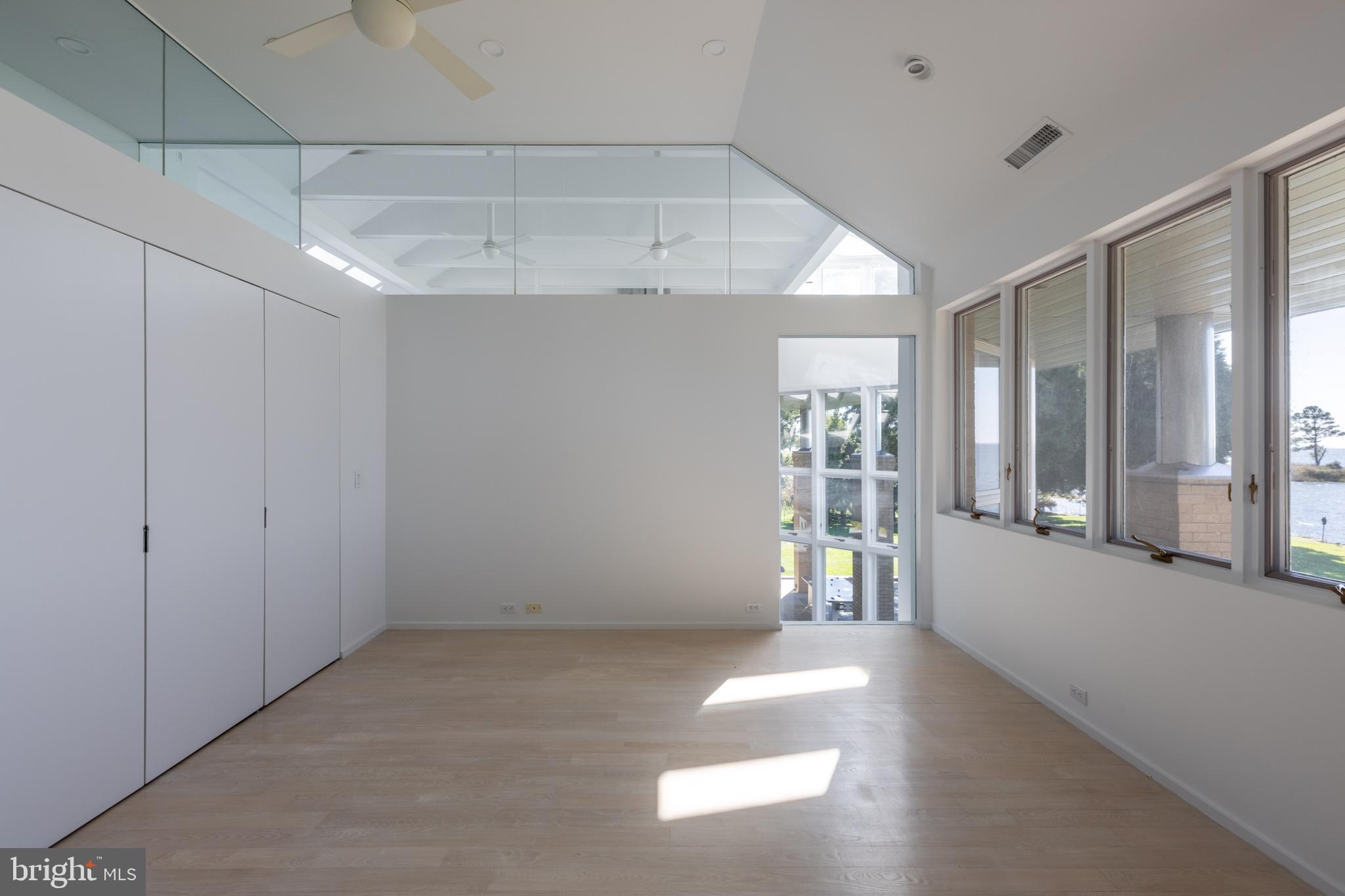 5084 Ferry Neck Road Royal Oak, MD 21662 - Photo 41 of 58 a view of empty room with wooden floor