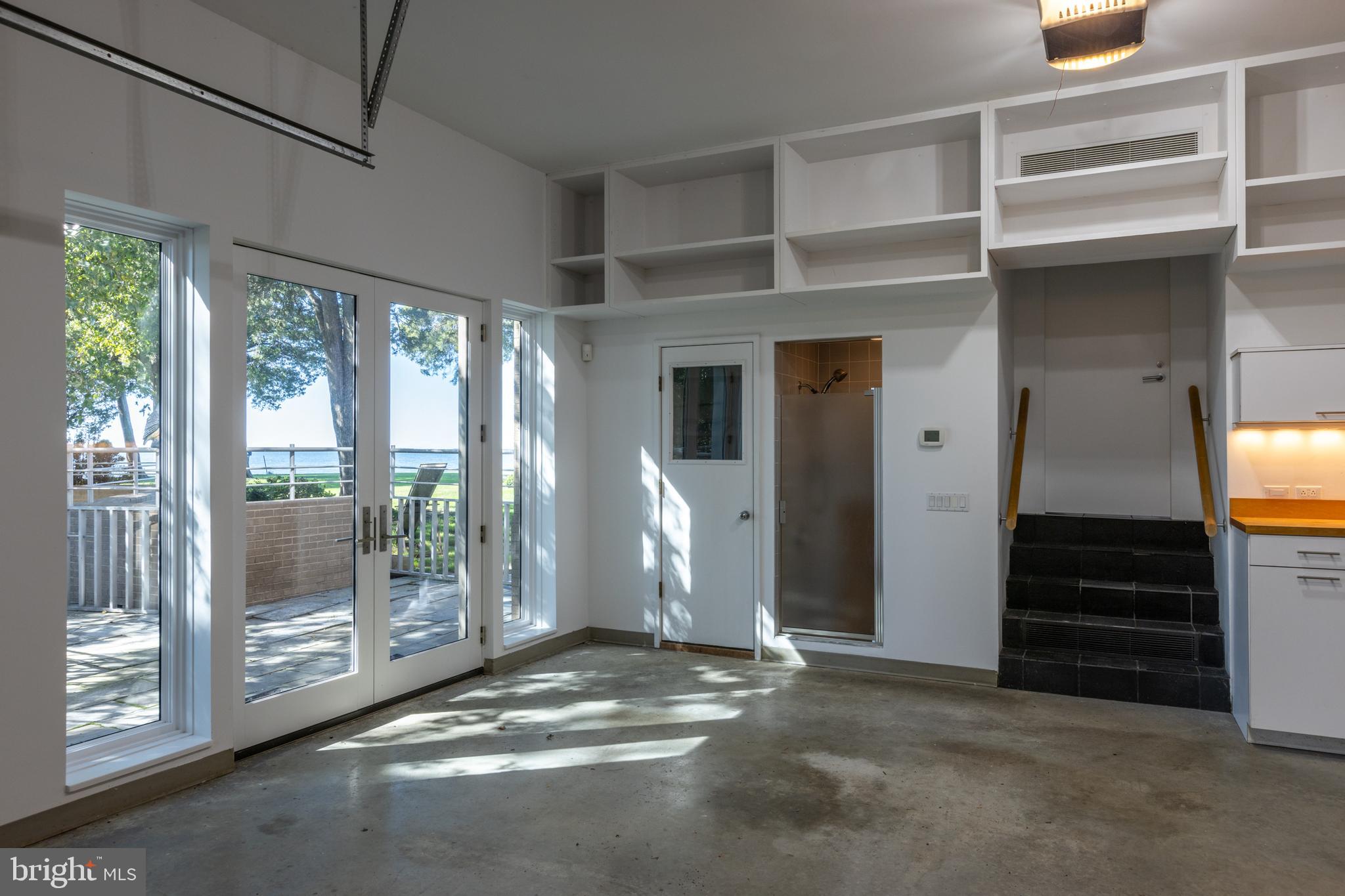 5084 Ferry Neck Road Royal Oak, MD 21662 - Photo 47 of 58 a view of empty room with wooden floor and fan