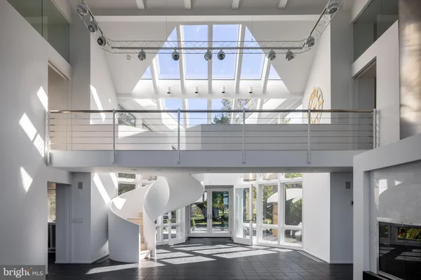 a view of entryway and kitchen