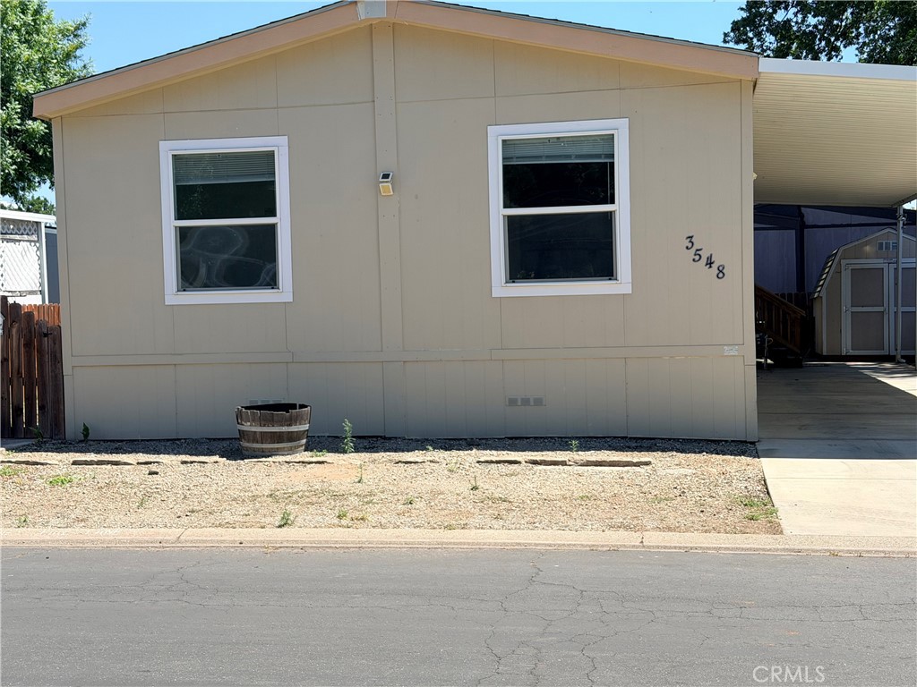 3548 Bianca Way Chico, CA 95973 - Photo 2 of 37 Front of home looking at Bedroom window on left, front room window on right.
