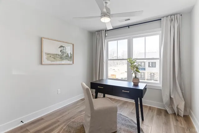 a workspace with wooden floor